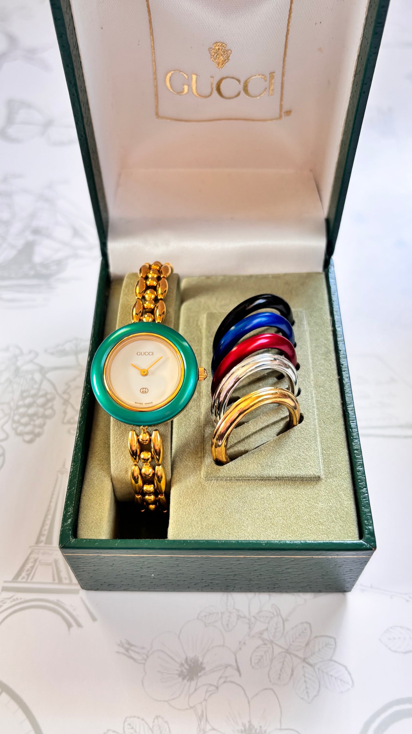 Gucci rice link watch with interchangeable bezels