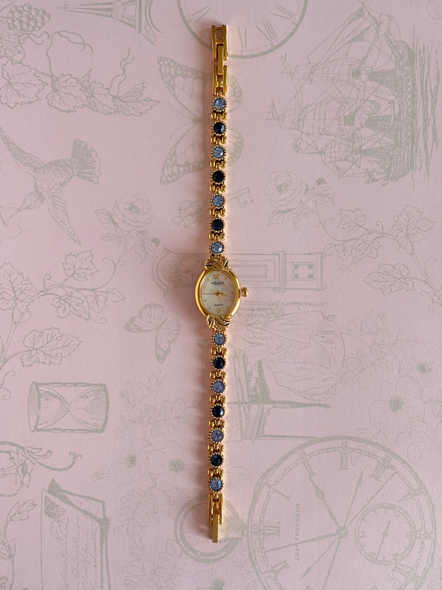 Vintage Gold Toned Watch With Blue Gems