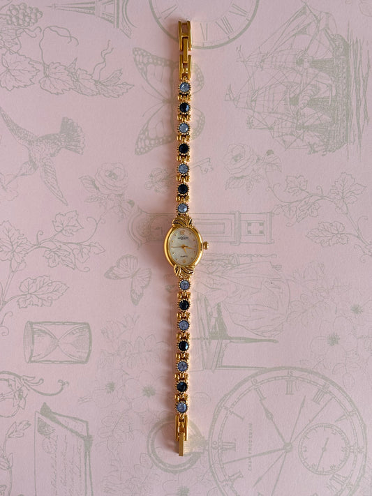 Vintage Gold Toned Watch With Blue Gems