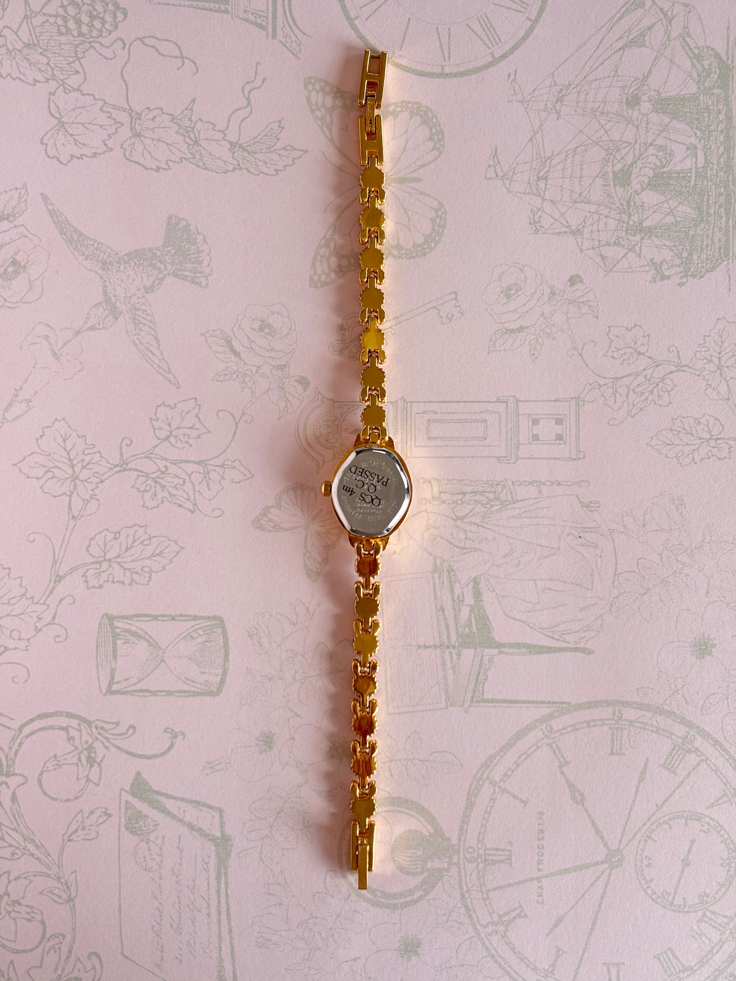 Vintage Gold Toned Watch With Blue Gems