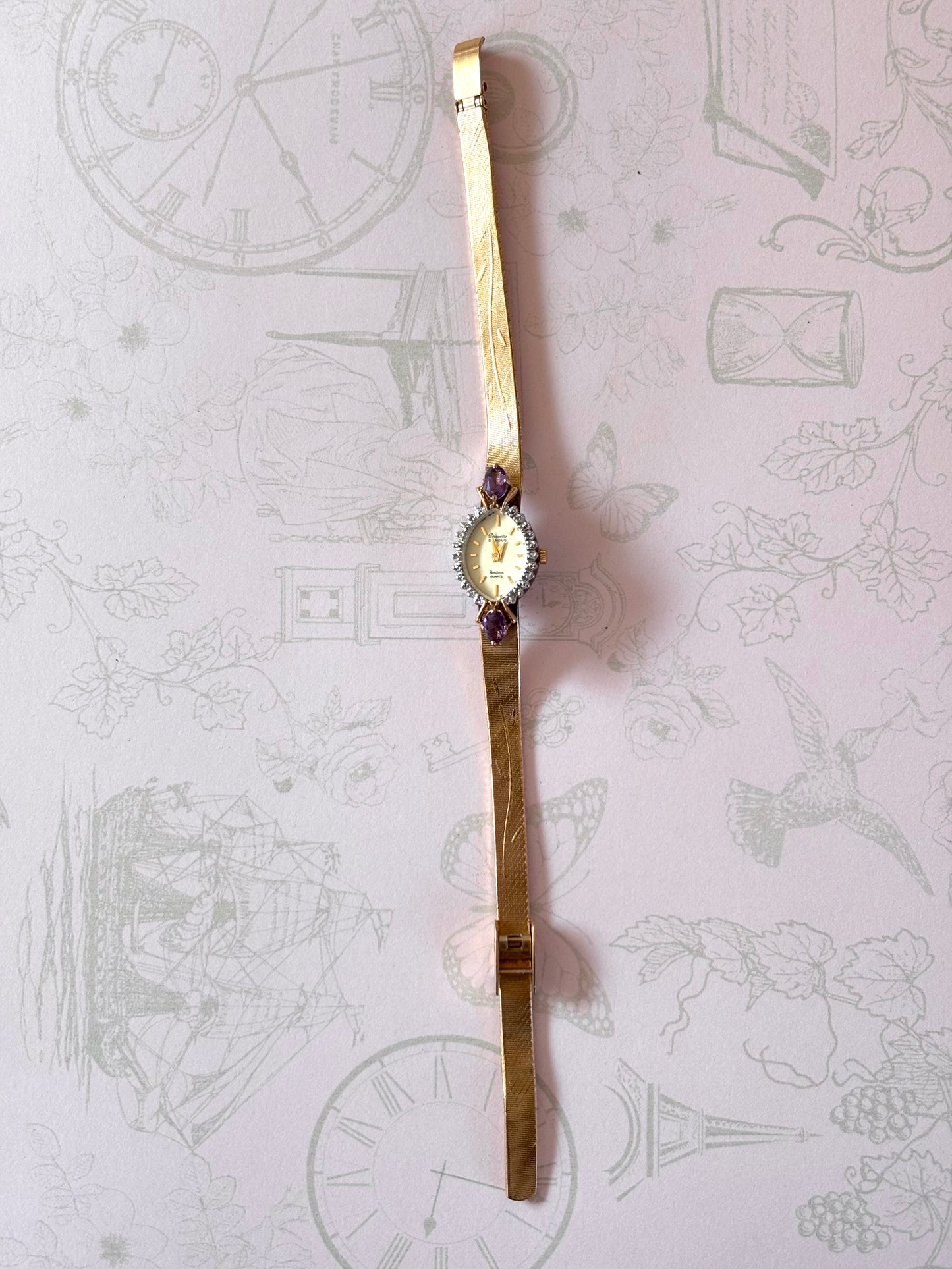 Vintage Gold Toned Watch with Purple Accents