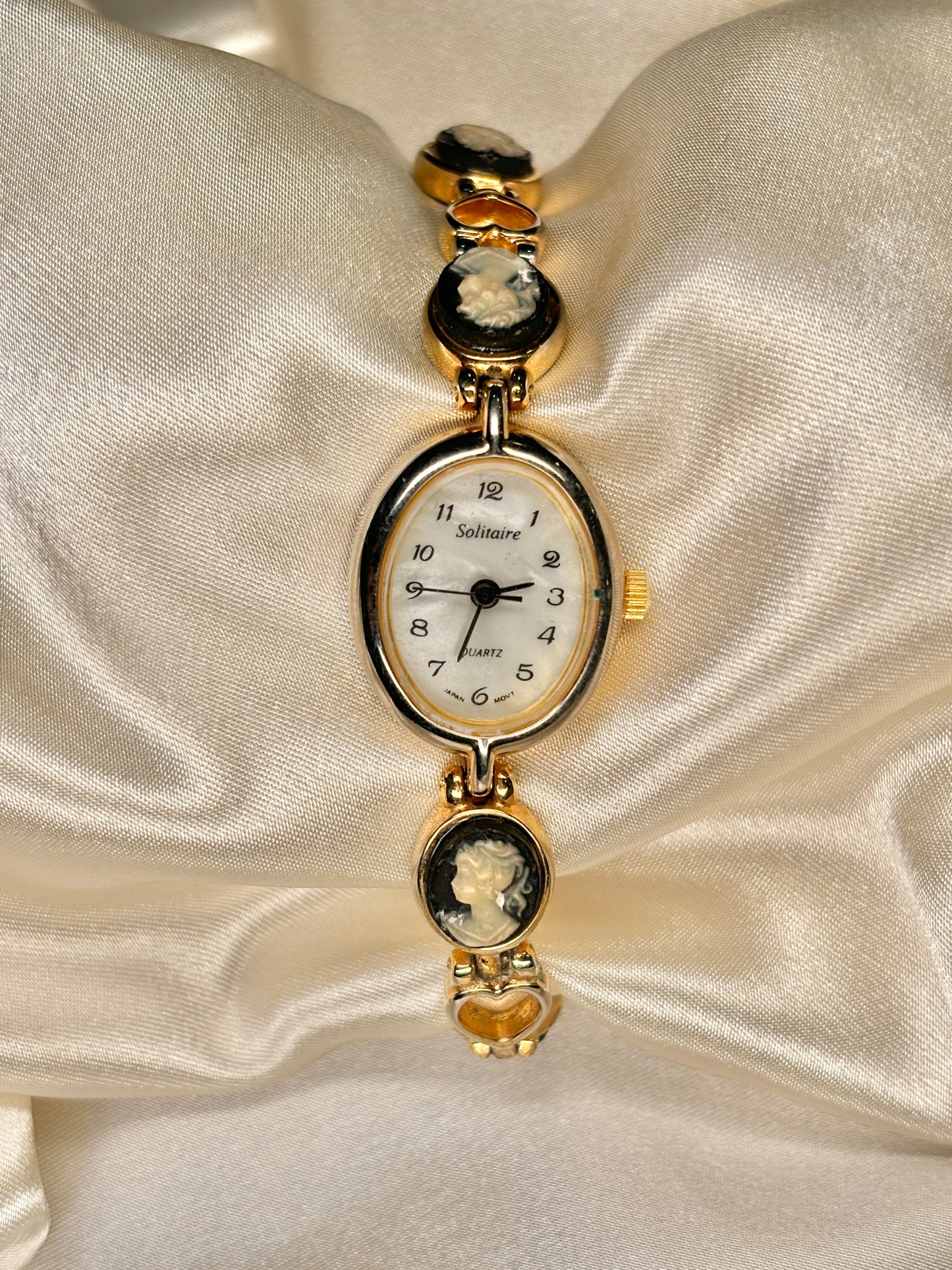 Cameo Gold Tone Solitaire Watch with Hearts