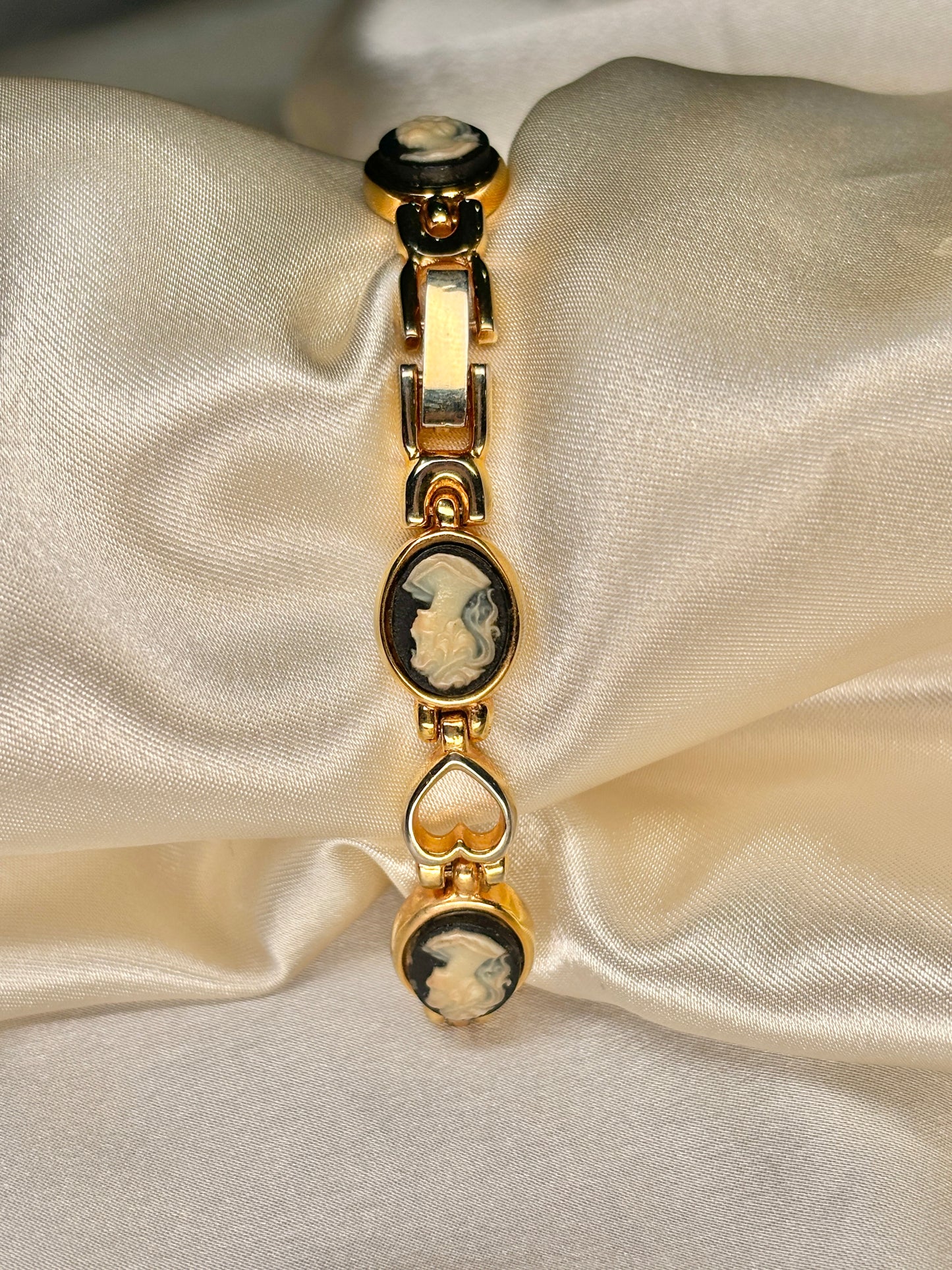 Cameo Gold Tone Solitaire Watch with Hearts